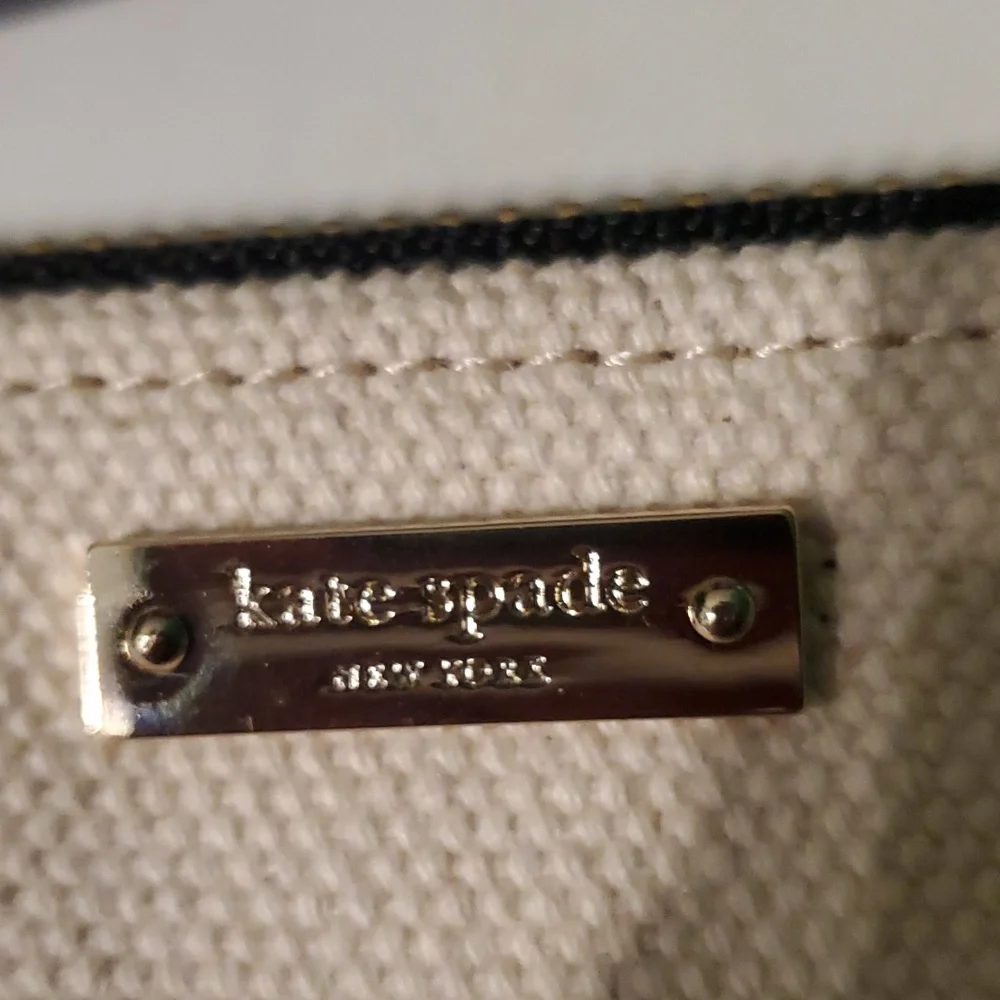 Kate Spade cream and Silver Cosmetic Bag